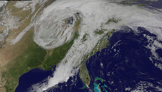 A swirling cloud system covers most of the Eastern United States in this satellite image