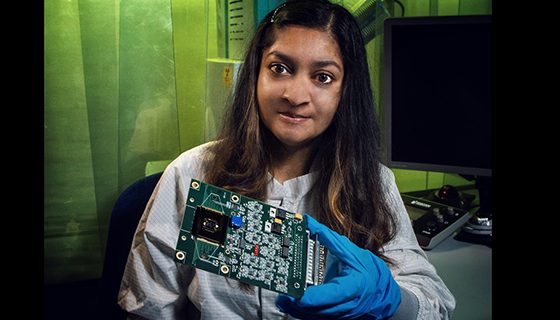 Mahmooda Sultana holds a circuit board