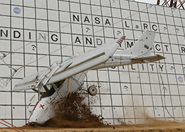 Small white airplane, with no crew, that was crashed purposely in a NASA test
