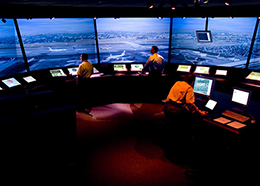 NASA researchers work inside a simulated air traffic control tower