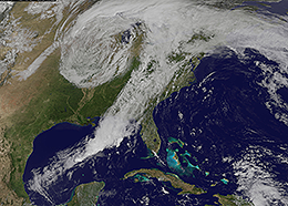 A swirling cloud system covers most of the Eastern United States in this satellite image