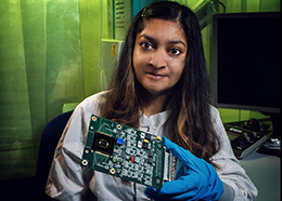 Mahmooda Sultana holds a circuit board