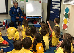 Astronaut Mark Vande Hei talks to a group of students