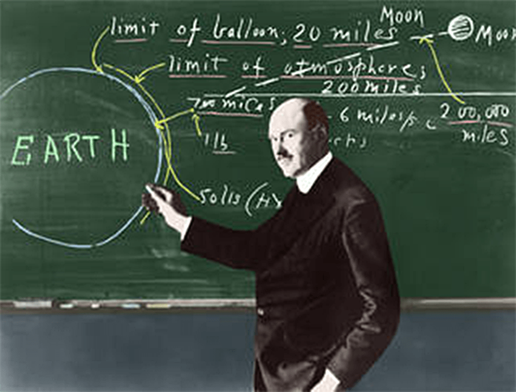 An illustration fo Dr. Robert H. Goddard in front of a chalkboard
