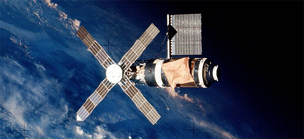 Skylab with the parasol in place and missing one of it's solar arrays.