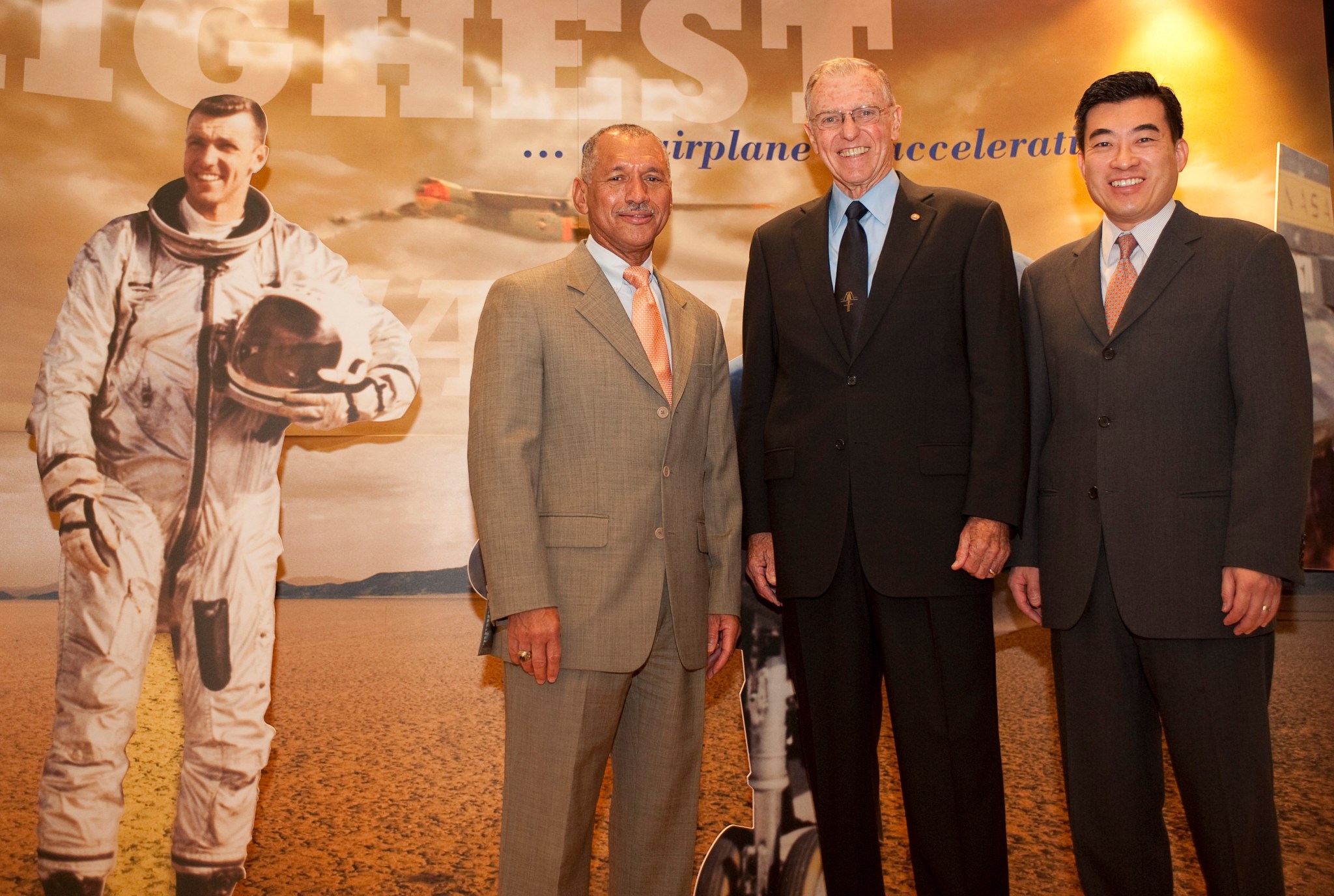 X-15 pilot Joe Engle standing in between Dr. Shin and NASA Administrator Charlie Bolden.
