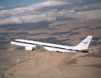NASA's Airborne Science Dc-8, displaying new colors in a check flight Feb. 34, 2004 over the Dryden Flight Research Center.