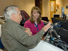 Kerianne Hobbs tries flight simulator.