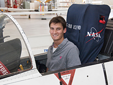 Michigan State University student and NASA intern Scott Buffa sits in the cockpit of an F-18 aircraft at NASA's Dryden Flight Research Center.