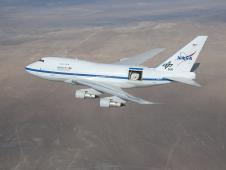 A German-built telescope is exposed during a flight of NASA's 747SP.