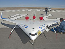 NASA Dryden engineer Gary Cosentino prepares the X-48B for flight.