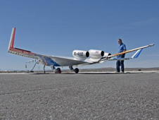 Cranfield Aerospace Limited technician Ian Brooks prepares the X-48B for flight.