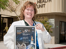 Katie Kirk of Palmdale, a nurse practioner at Dryden's Health Unit, displays her NASA Space Flight Awareness Honoree Award.