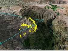 The false-color yellow markings on this image taken July 22, 2011 by NASA's Autonomous Modular Sensor represent hot spots of the Eagle fire in San Diego County, Calif. The blue lines represent the approximate flight path of NASA's King Air aircraft that carried the scanner.
