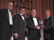 NASA Administrator Charles Bolden, right, presents the National Security and International Affairs Medal to Michael Duncan, former deputy chief medical officer at NASA's Johnson Space Center in Houston, Thursday evening, Sept. 15, 2011, at the 2011 Samuel J. Heyman Service to America Medals, or Sammies, gala in Washington. Duncan was joined by J.D. Polk, also a medical doctor, and Clinton Cragg at left. Photo Credit: (NASA/Paul E. Alers)