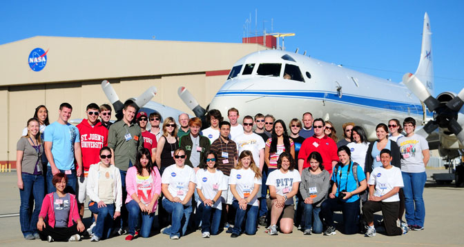 More than 30 undergraduate and graduate students from a like number of colleges and universities gathered in front of NASA's P-3B Orion Earth science aircraft at the Dryden Aircraft Operations Facility in Palmdale, Calif., prior to a research mission June 25.