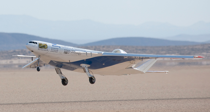The remotely operated X-48C Blended Wing Body aircraft lifts off Rogers Dry Lake at Edwards Air Force Base, Calif., on its first test flight Aug. 7.