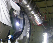 Technician cleaning SOFIA's mirror