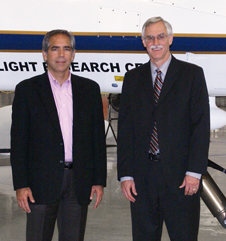 NASA Dryden center director David McBride and Frank Pace, president of General Atomics Aeronautical Systems' Aircraft Systems Group, were captured by the photographer in front of NASA's MQ-9 - Ikhana - during McBride's recent visit to the firm's Poway, Calif., facility.