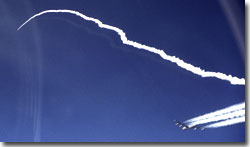X-43A modified Pegasus booster rocket accelerate after launch from NASA's B-52B launch aircraft.
