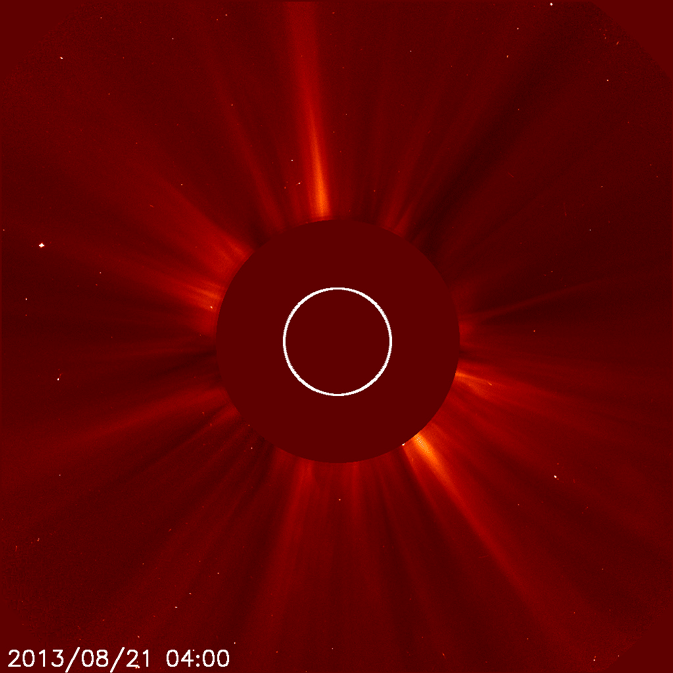 This animated GIF shows a faint CME cloud expanding out from the left side of the sun as seen by the Solar and Heliospheric Observatory.