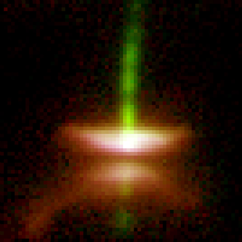 A blurry image of a the star Fomalhaut. Two golden spots with a green line going down the center.