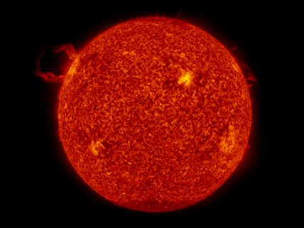 The Sun with prominence visible in the upper left taken by the AIA instrument on board SDO.