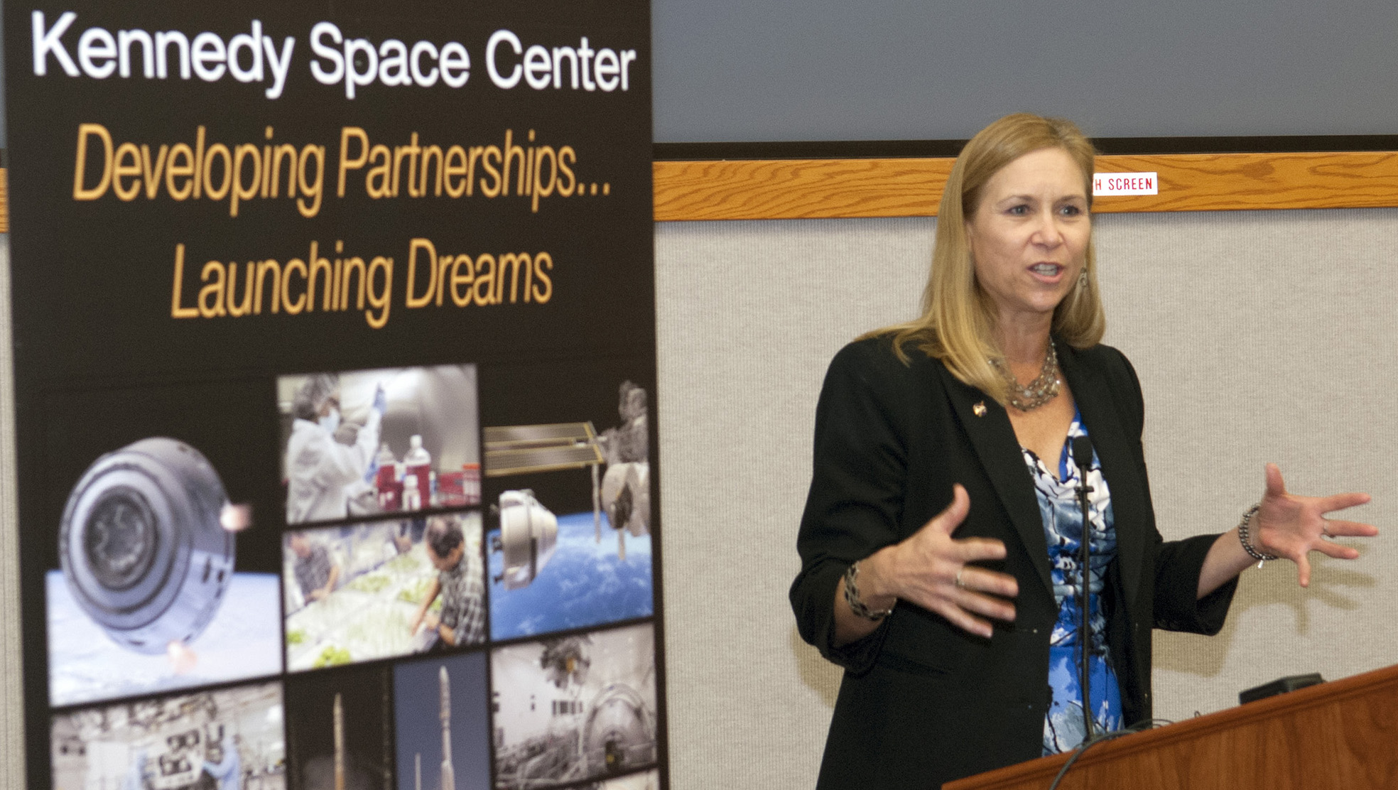Janet Petro addresses the workforce at Kennedy Space Center during an innovation expo.