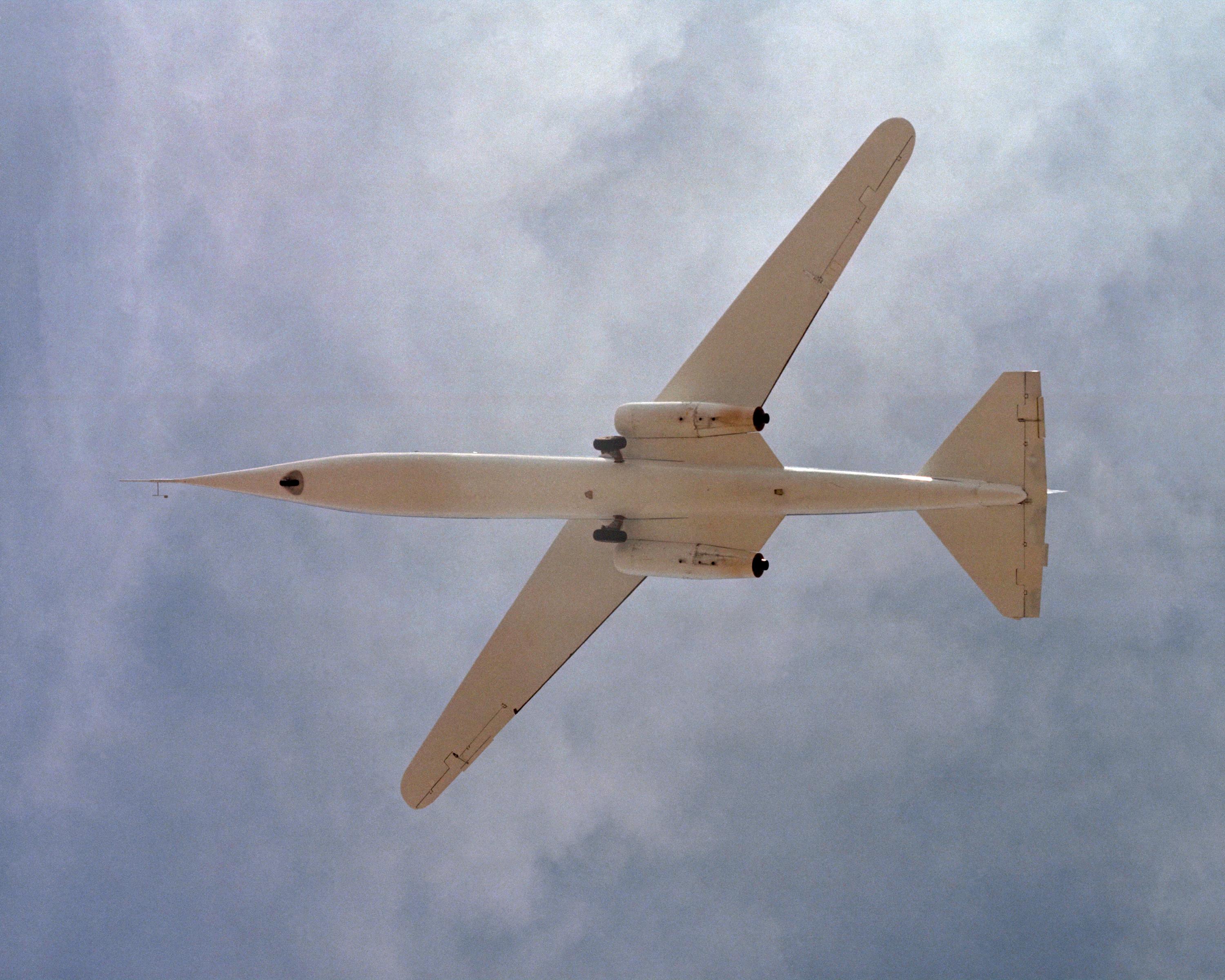 An oblique wing aircraft in flight.