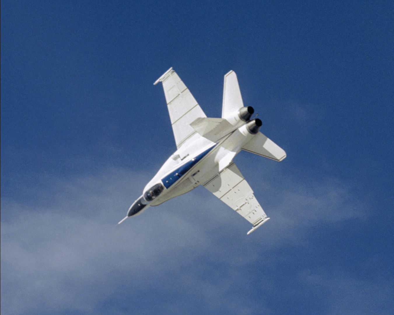 F/A-18 doing maneuvers while in flight.