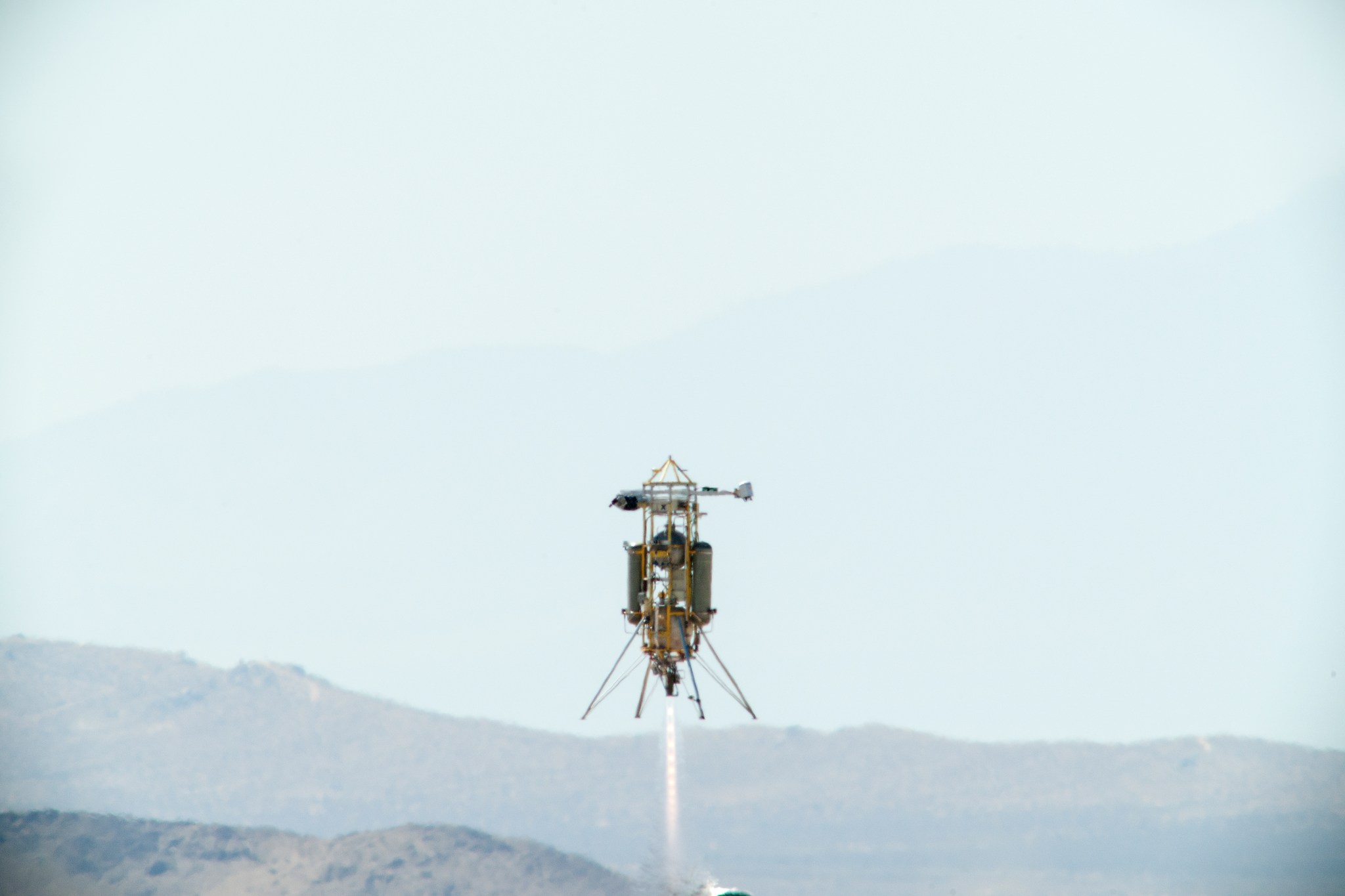 Masten's vertical-takeoff, vertical-landing Xombie technology demonstration vehicle rockets skyward