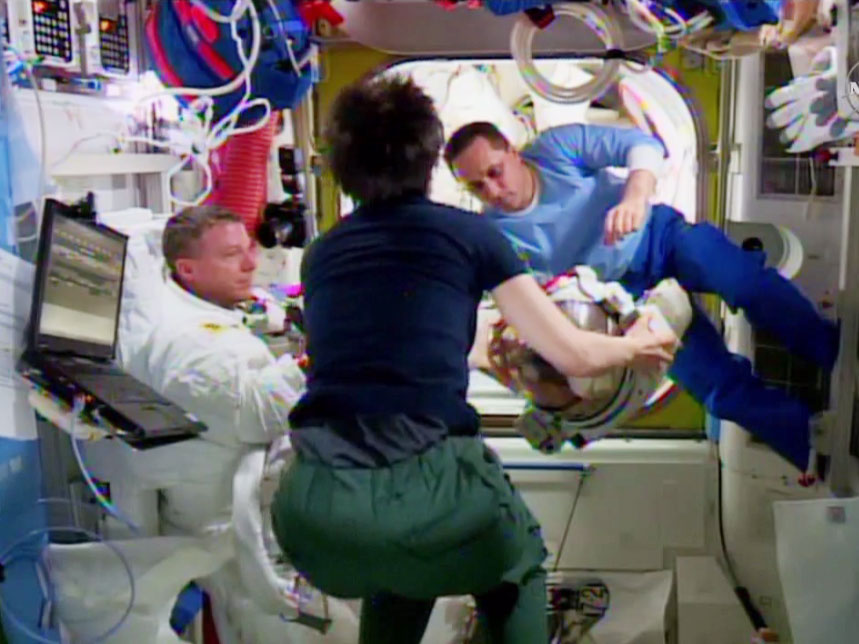 Crew Checks Helmet