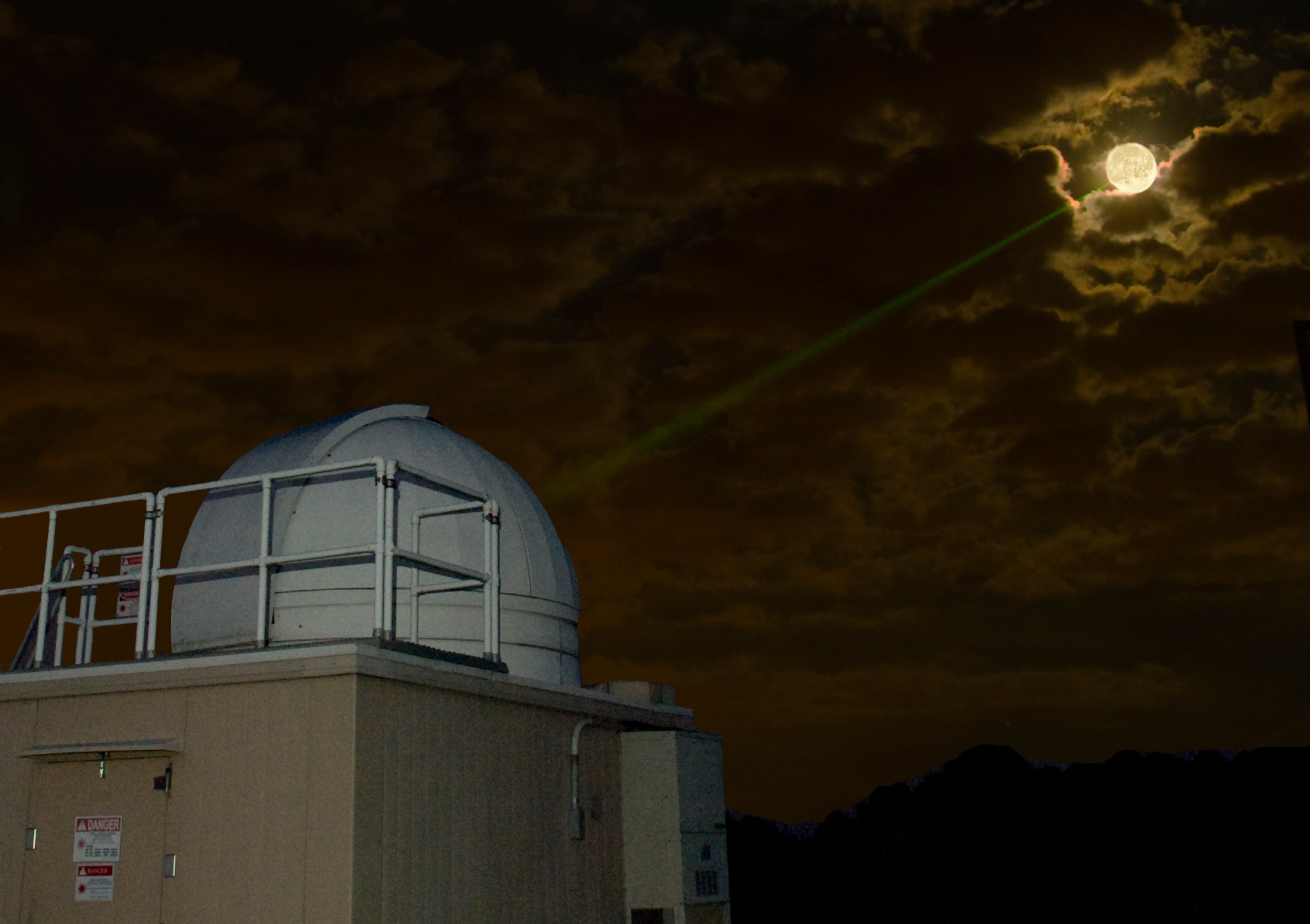 a laser captures the moon