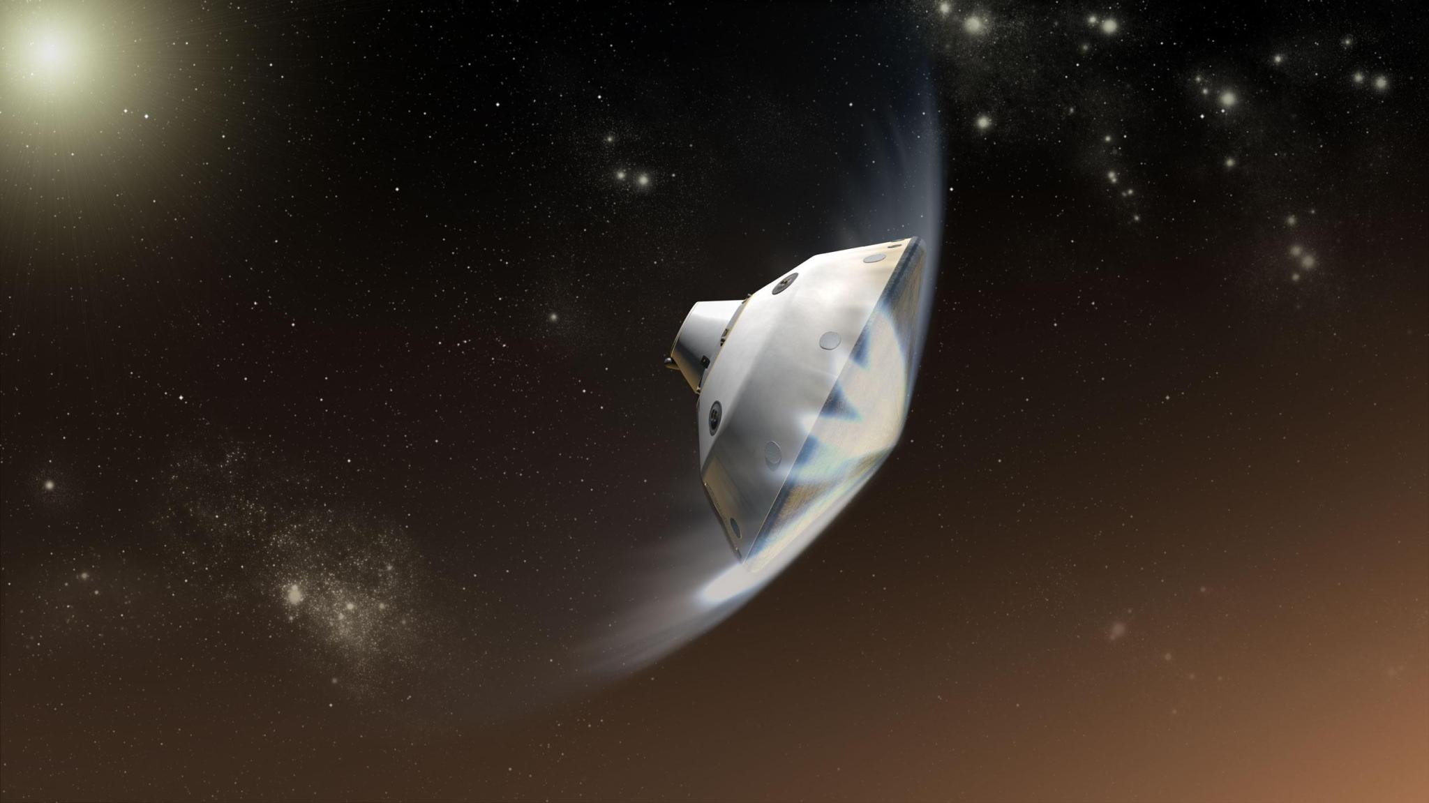 This artist's concept depicts the interaction of NASA's Mars Science Laboratory spacecraft.
