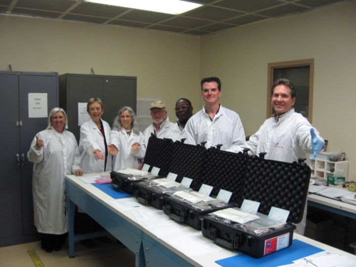 Ames Seedling Growth-1 project team members finish packing the payload hardware before it is transported to Kennedy Space Center