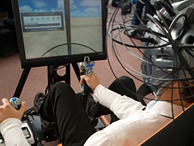 A flight simulator creates the feeling of flying a plane under a variety of conditions. 