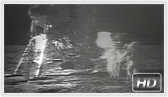 Aldrin and Armstrong raise the American flag on the moon.