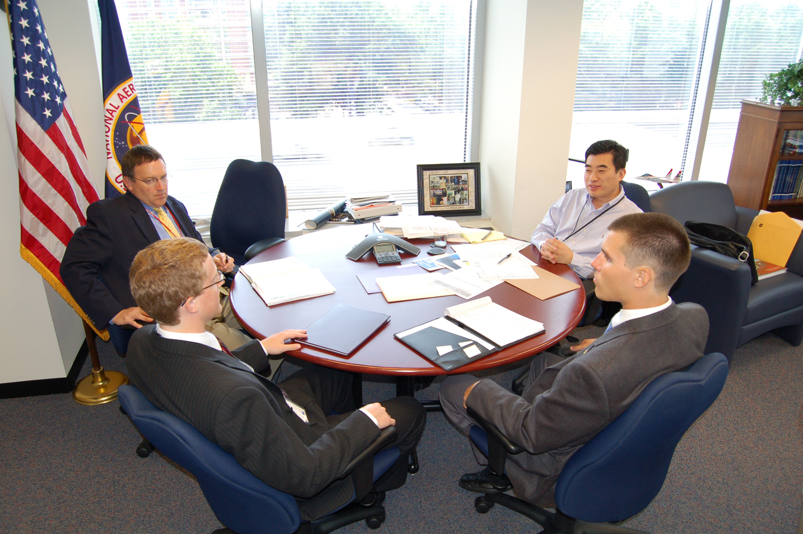 NASA interns sitting with Tom Irvine and Dr. Shin.