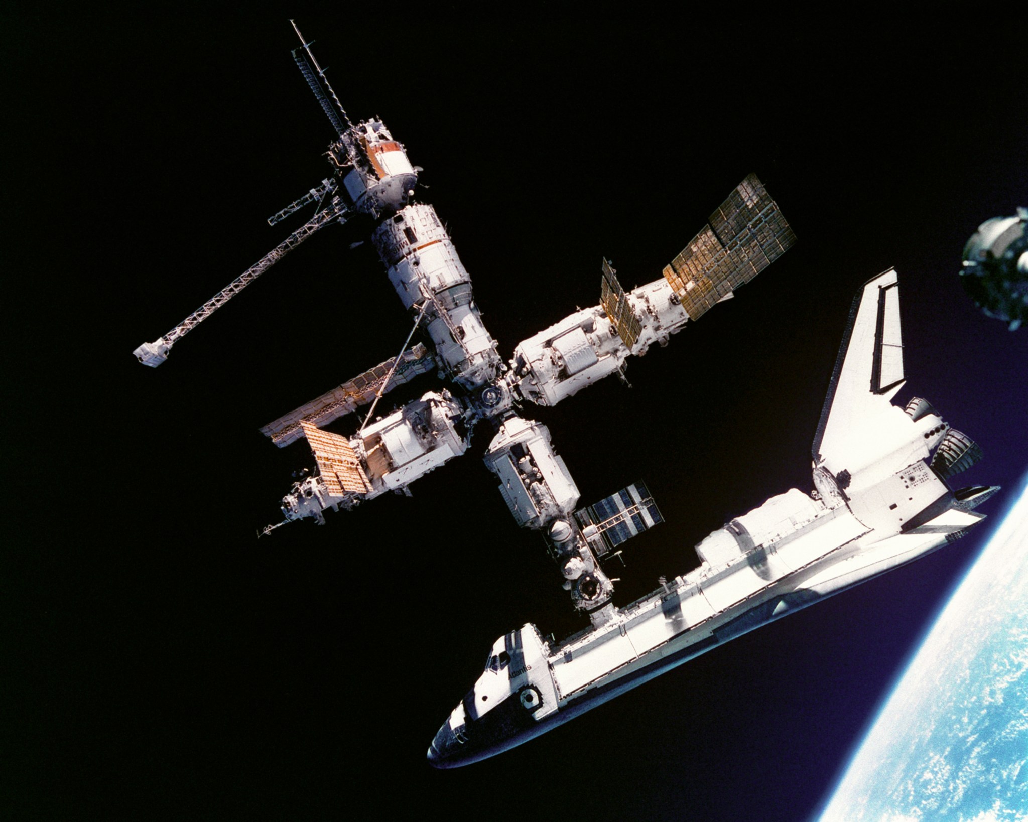 Space shuttle Atlantis docked with the Russian Mir space station in 1995.