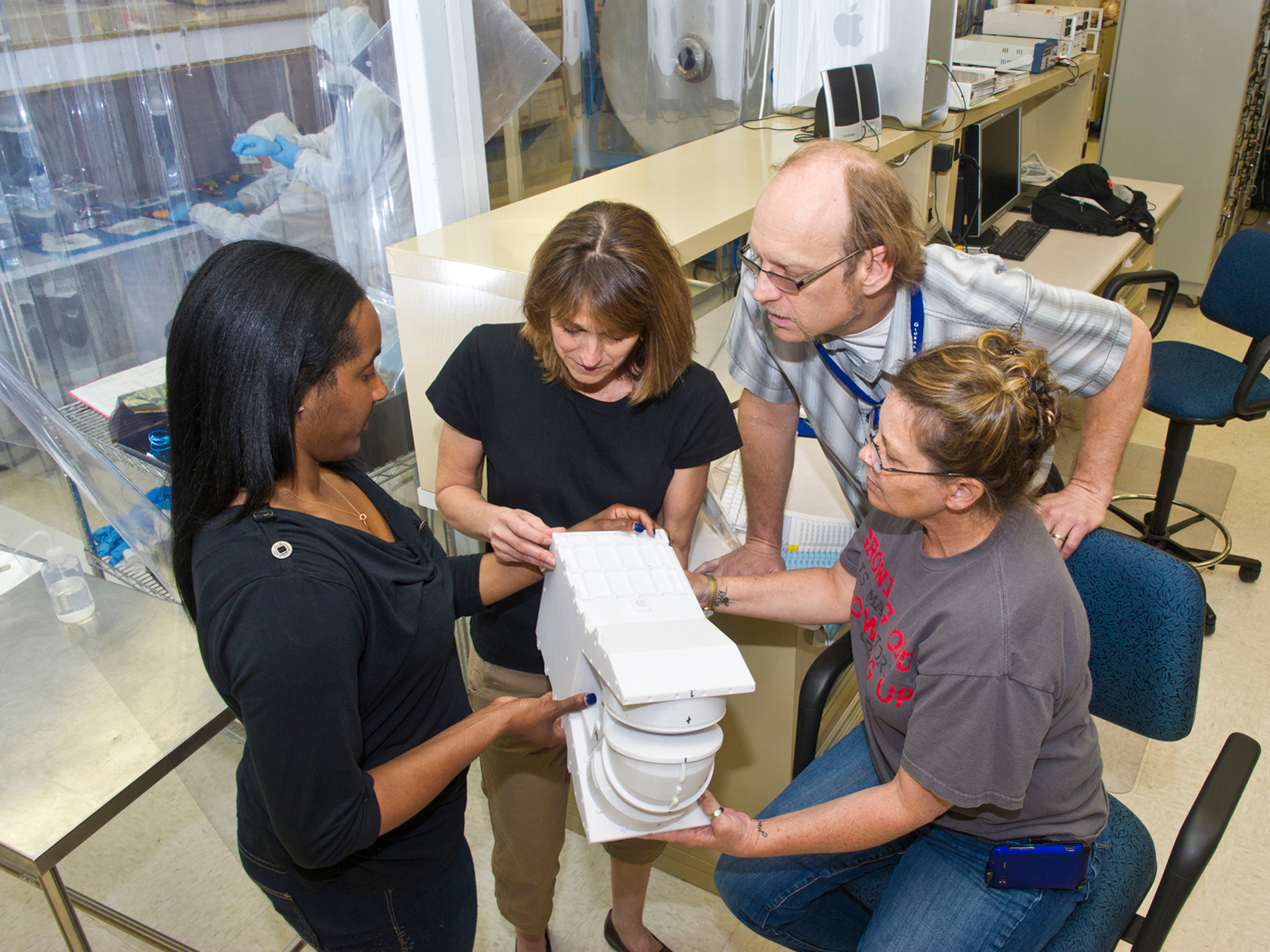 An ion spectrometers launched on the Magnetospheric Multiscale mission is tested inside a facility that simulates the space environment.