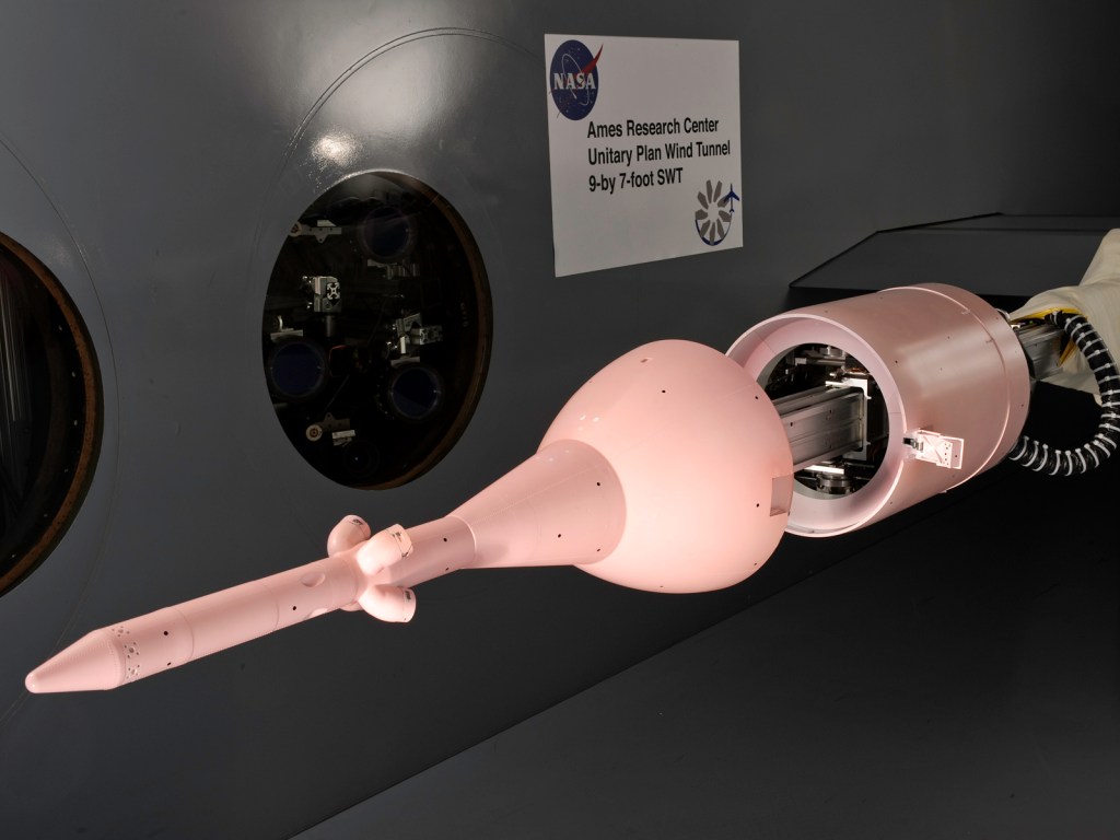 model of Crew Exploration Vehicle painted pink in wind tunnel