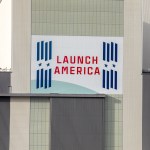 Seen here is the “Launch America” banner for NASA’s Commercial Crew Program on the iconic Vehicle Assembly Building at Kennedy Space Center in Florida.