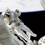 Cosmonaut Yuri I. Malenchenko with Earth in the background as he performs a spacewalk as part of the STS-106 mission on Sept. 11, 2000.