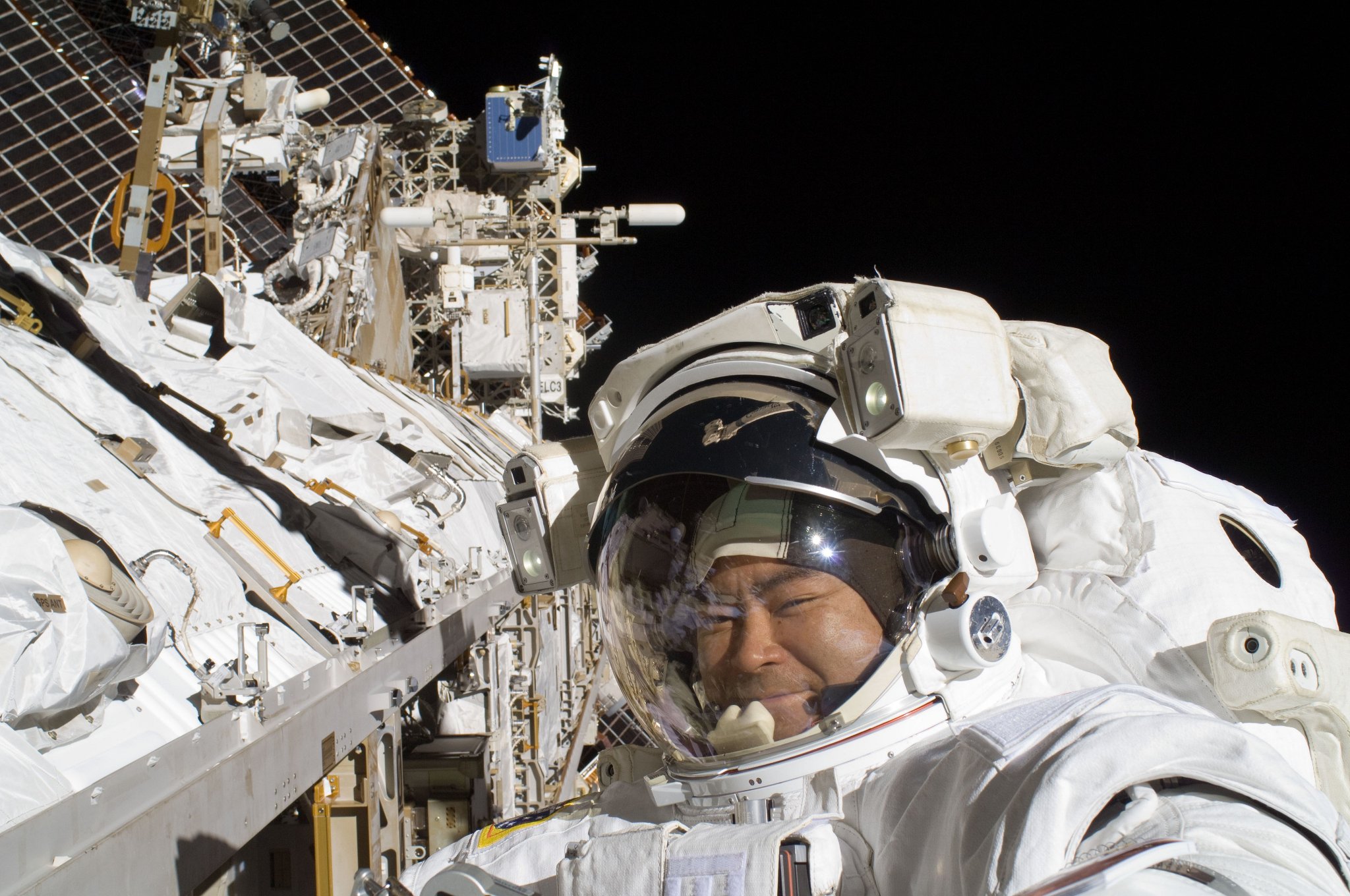 JAXA astronaut Akihiko Hoshide performs maintenance work on the International Space Station during an Expedition 32 spacewalk. A
