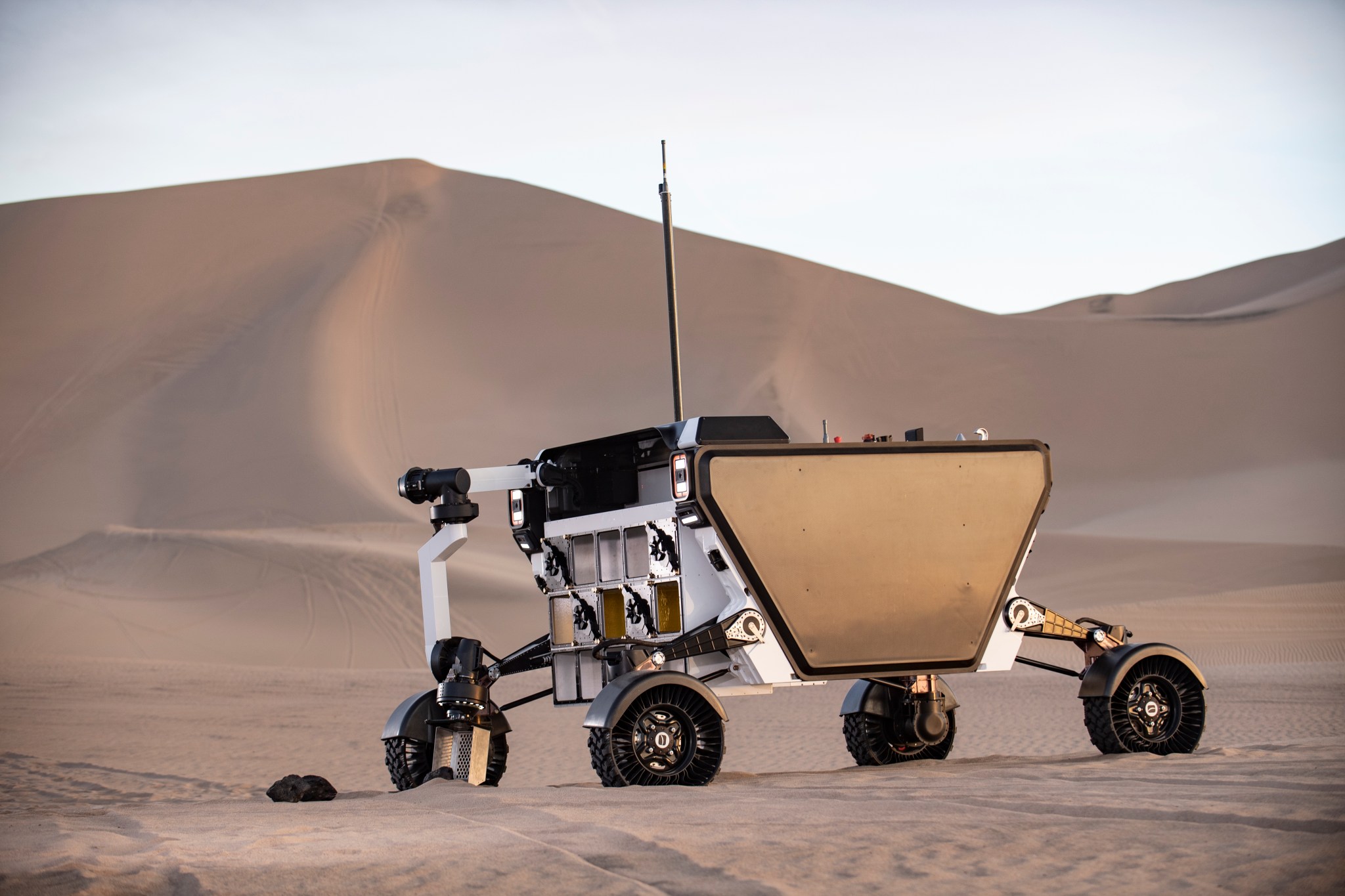 Astrobotic CubeRover on planetary surface.