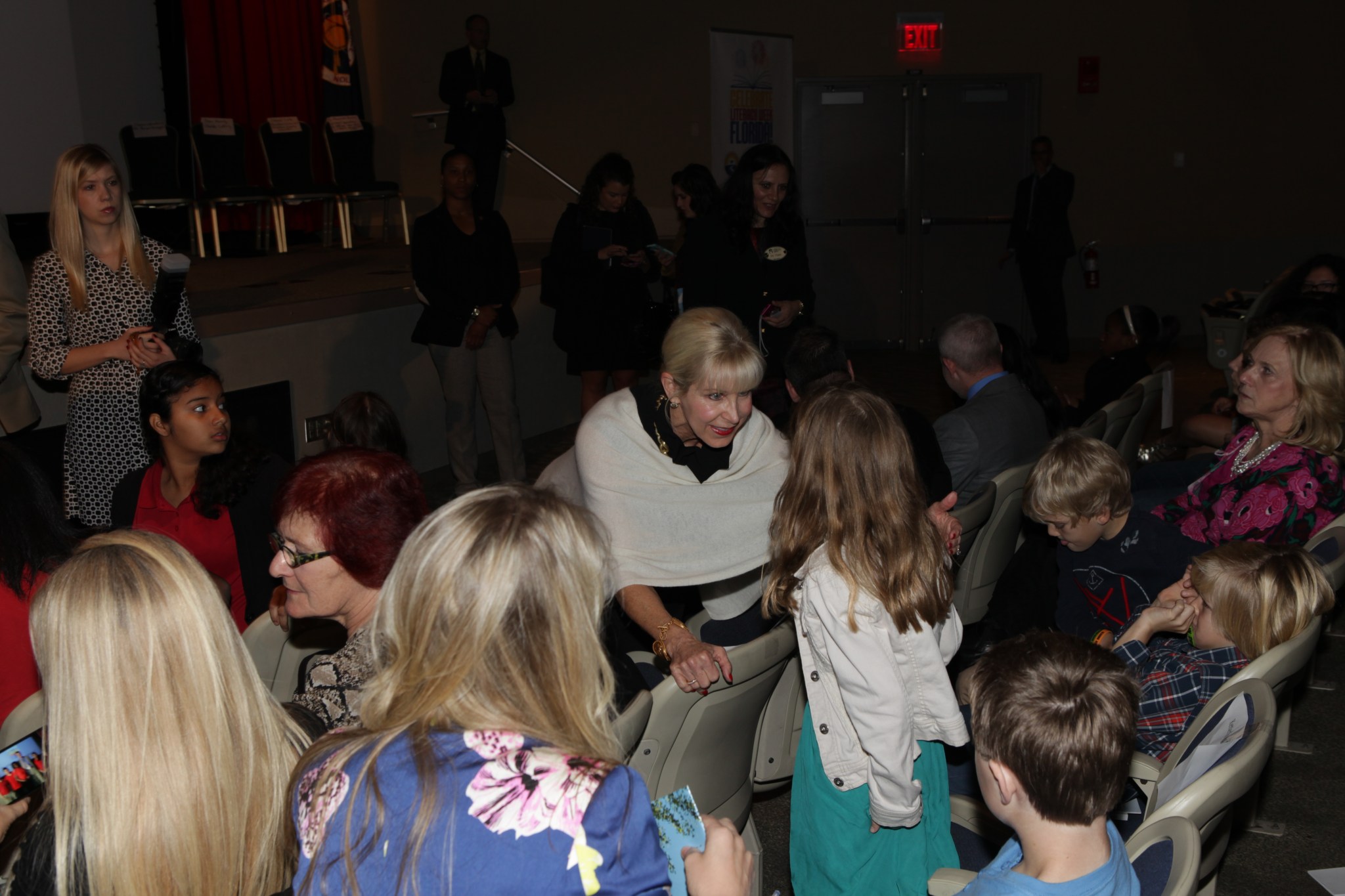 Florida first lady Ann Scott visits with children at Kennedy Space Center Visitor Complex.