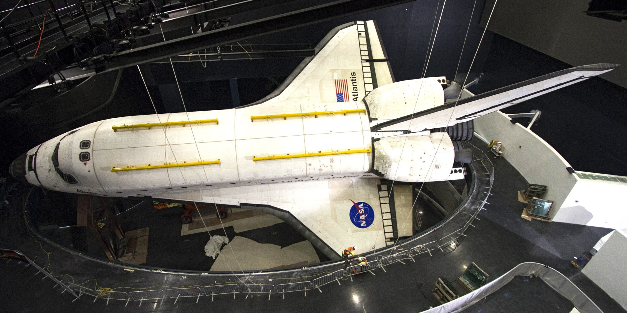 Construction crews completed removal of plastic shrink-wrap from the shuttle Atlantis on April 26.