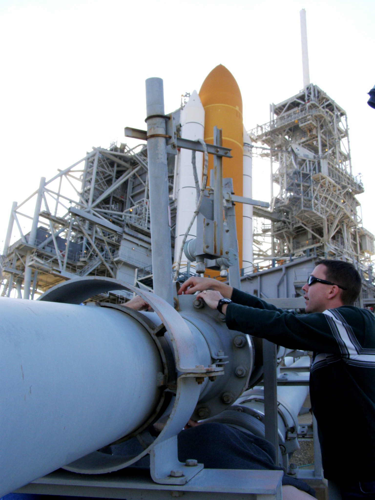 Dr. Luke Roberson applies hydrogen detection tape