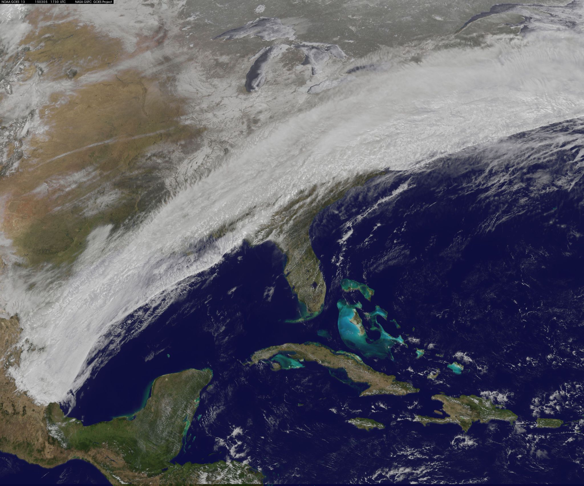 GOES-East image from March 5 of snowstorm. A streak of white cloud obscures the ground from eastern Mexico along the Atlantic coast of the US.