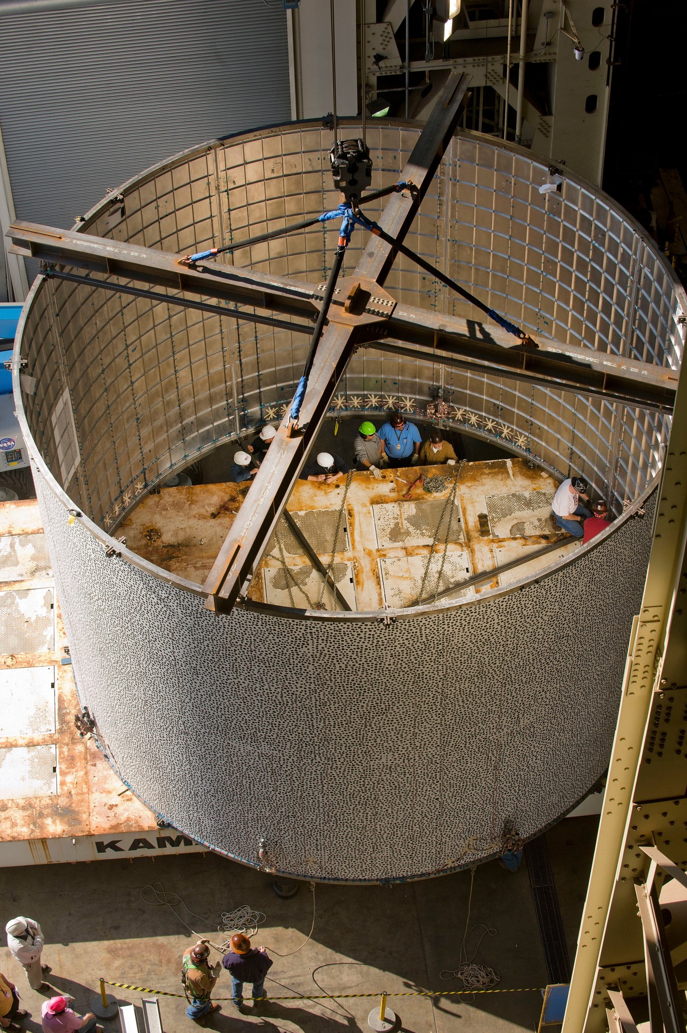 NASA engineers prepared a test article, similar in size to a rocket fuel tank, for a series of tests conducted inside the structural test area at the Marshall Center.